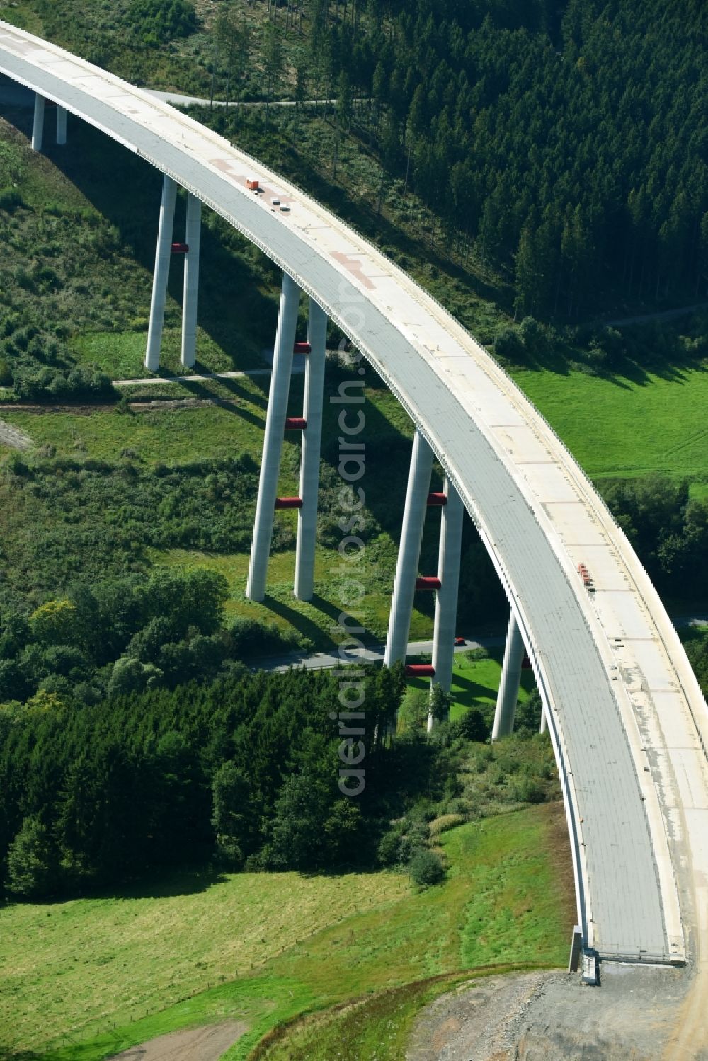 Bestwig from the bird's eye view: Viaduct Nuttlar under construction overlooking the municipality Bestwig in North Rhine-Westphalia