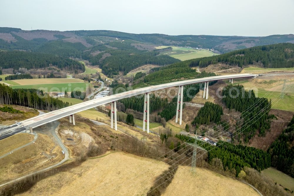 Bestwig from the bird's eye view: Viaduct Nuttlar under construction overlooking the municipality Bestwig in North Rhine-Westphalia