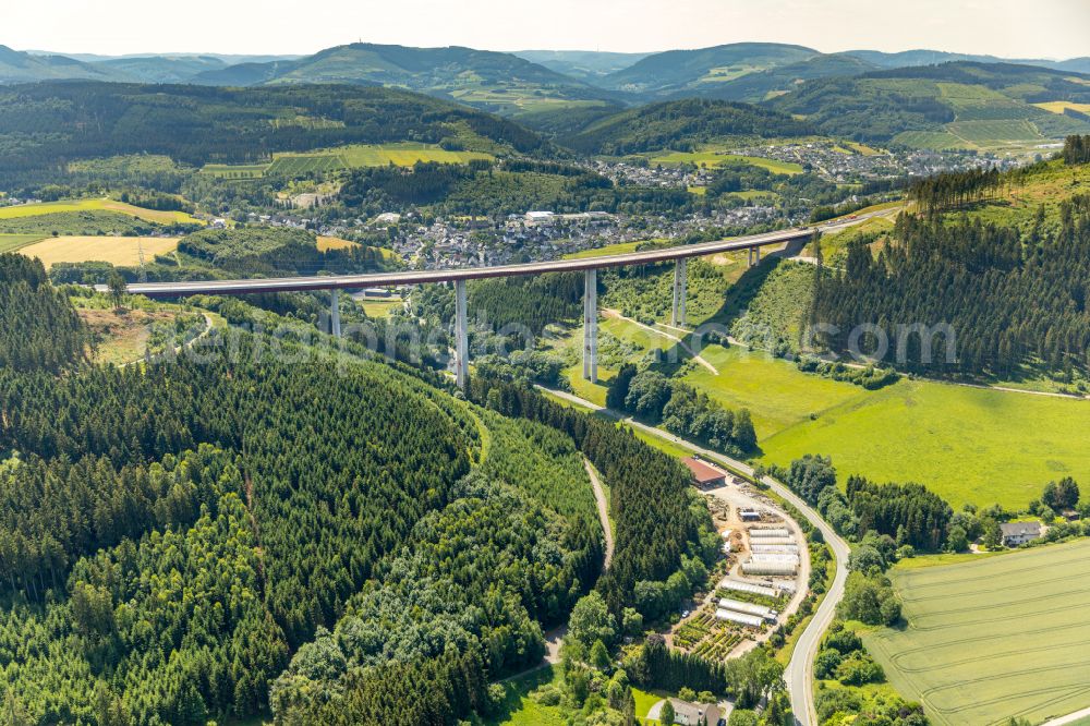 Bestwig from the bird's eye view: Viaduct Nuttlar under construction overlooking the municipality Bestwig at Sauerland in North Rhine-Westphalia