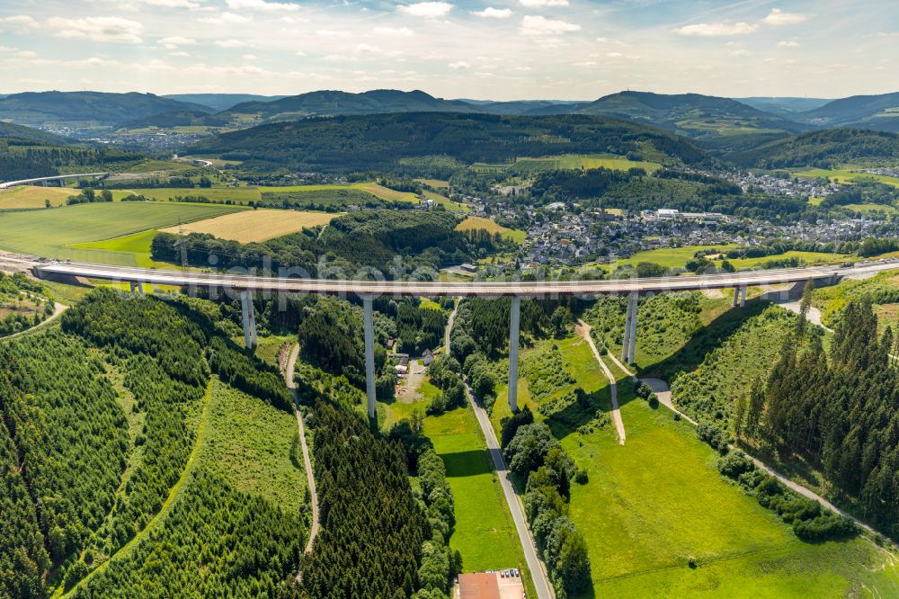 Bestwig from the bird's eye view: Viaduct Nuttlar under construction overlooking the municipality Bestwig at Sauerland in North Rhine-Westphalia