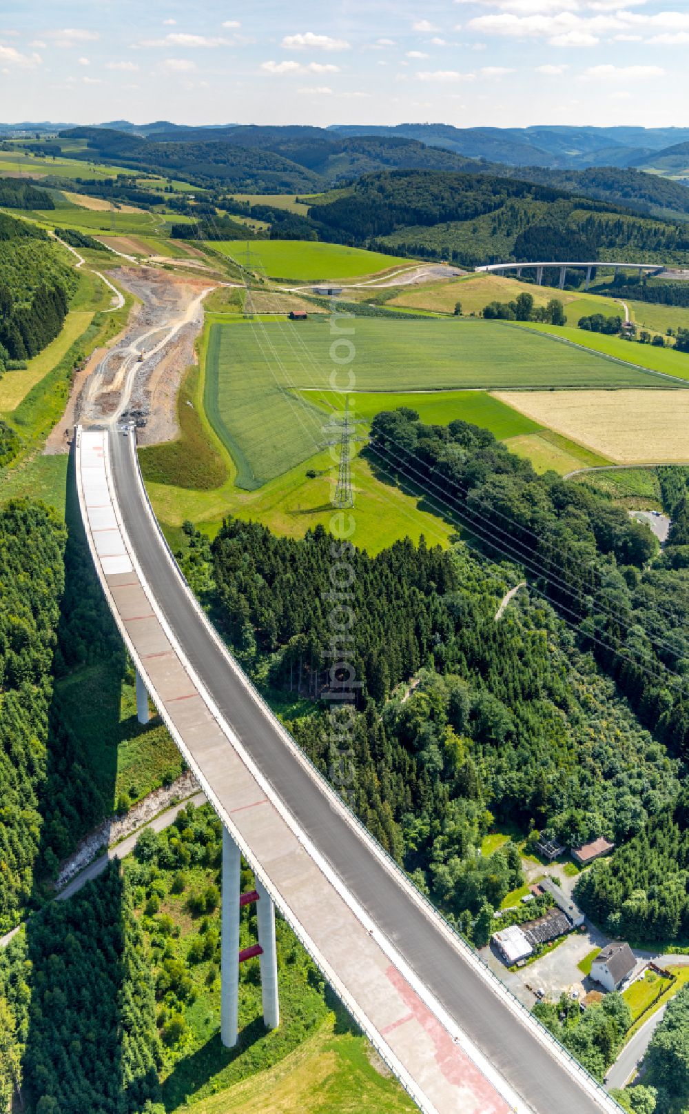 Aerial image Bestwig - Viaduct Nuttlar under construction overlooking the municipality Bestwig at Sauerland in North Rhine-Westphalia