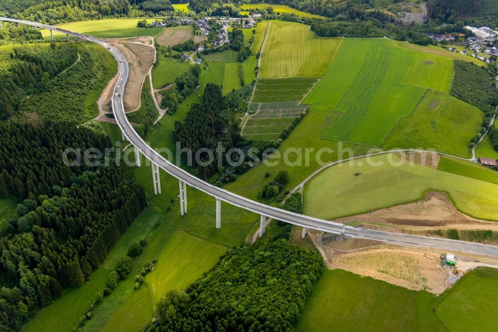 Aerial image Bestwig - Viaduct Nuttlar under construction overlooking the municipality Bestwig in North Rhine-Westphalia