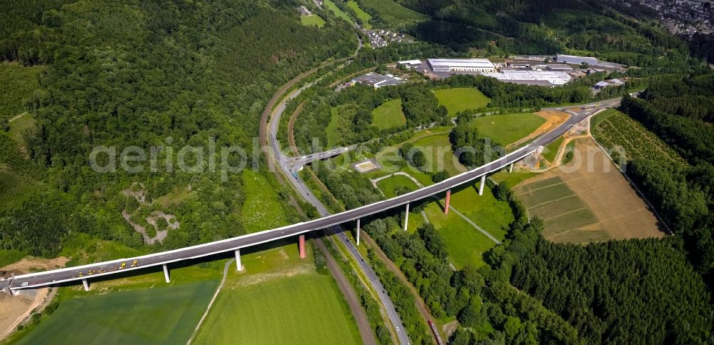 Bestwig from the bird's eye view: Viaduct Nuttlar under construction overlooking the municipality Bestwig in North Rhine-Westphalia