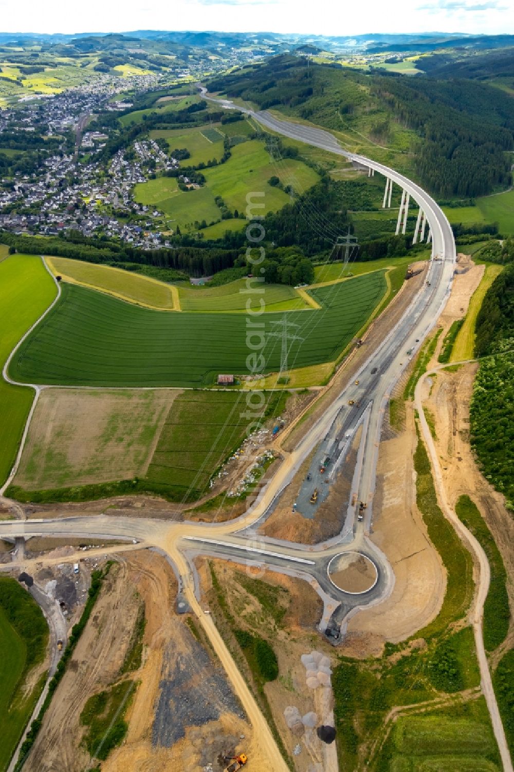 Bestwig from the bird's eye view: Viaduct Nuttlar under construction overlooking the municipality Bestwig in North Rhine-Westphalia