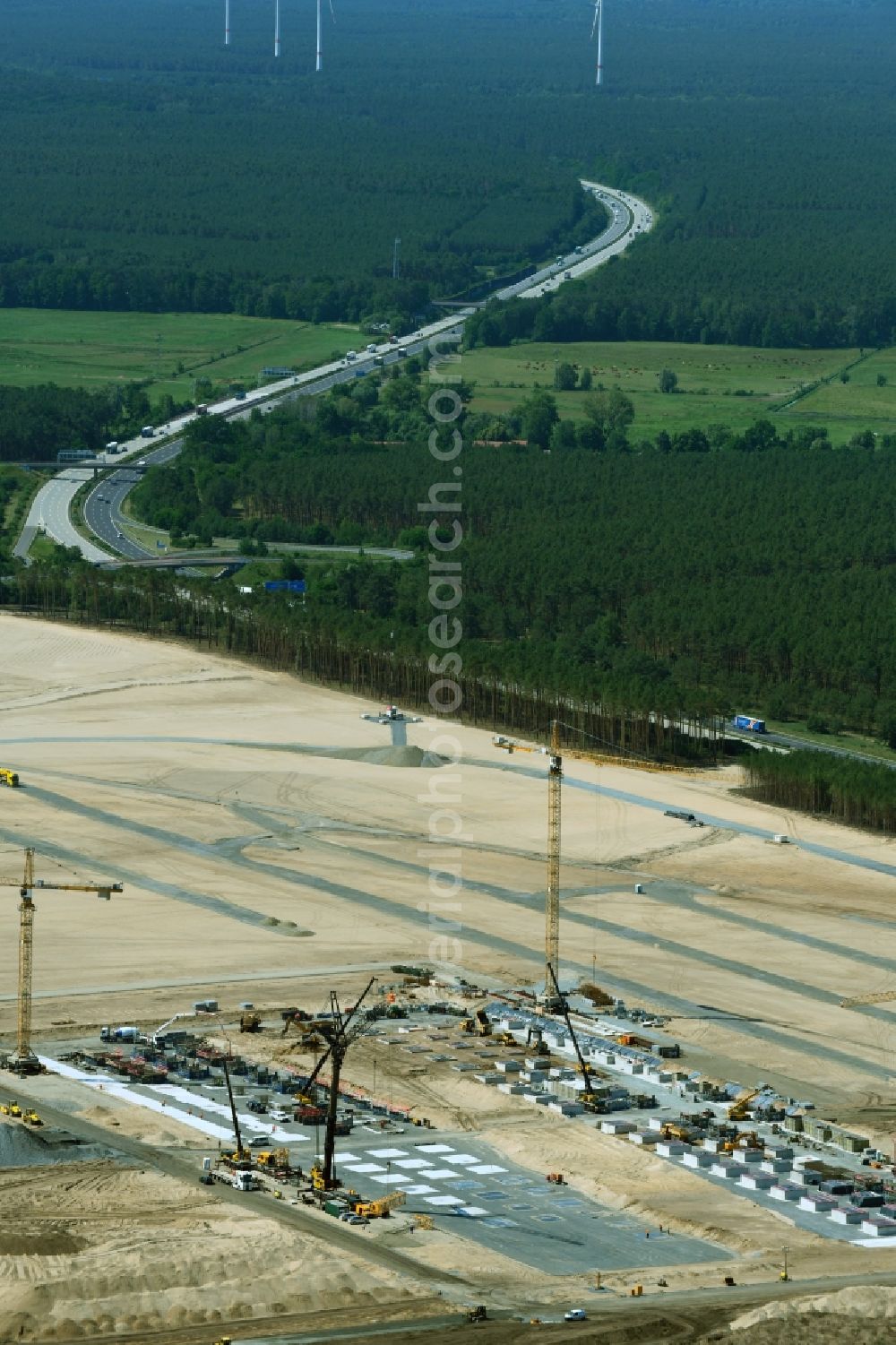 Aerial image Grünheide (Mark) - Construction site for the new building of Tesla Gigafactory 4 on Schlehenweg - Eichenstrasse in the district Freienbrink in Gruenheide (Mark) in the state Brandenburg, Germany