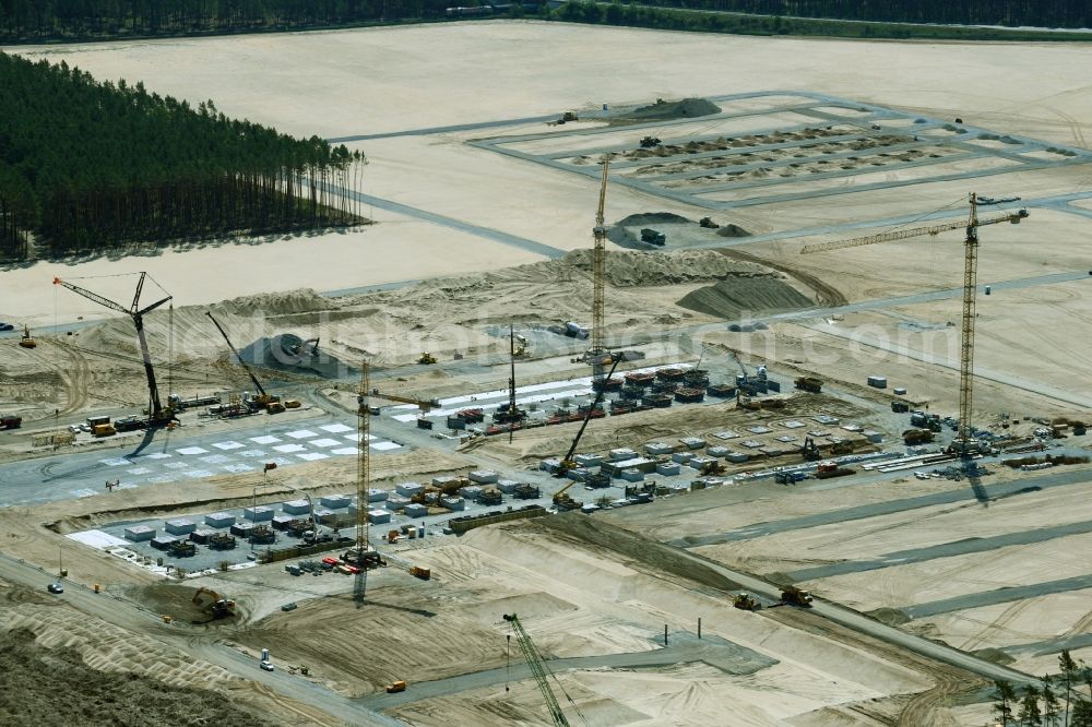 Aerial image Grünheide (Mark) - Construction site for the new building of Tesla Gigafactory 4 on Schlehenweg - Eichenstrasse in the district Freienbrink in Gruenheide (Mark) in the state Brandenburg, Germany