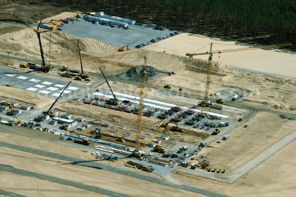 Aerial photograph Grünheide (Mark) - Construction site for the new building of Tesla Gigafactory 4 on Schlehenweg - Eichenstrasse in the district Freienbrink in Gruenheide (Mark) in the state Brandenburg, Germany