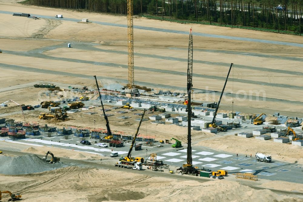 Aerial photograph Grünheide (Mark) - Construction site for the new building of Tesla Gigafactory 4 on Schlehenweg - Eichenstrasse in the district Freienbrink in Gruenheide (Mark) in the state Brandenburg, Germany