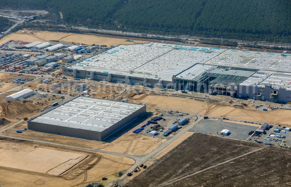 Grünheide (Mark) from the bird's eye view: Construction site for the new building of Tesla Gigafactory 4 on Schlehenweg - Eichenstrasse in the district Freienbrink in Gruenheide (Mark) in the state Brandenburg, Germany