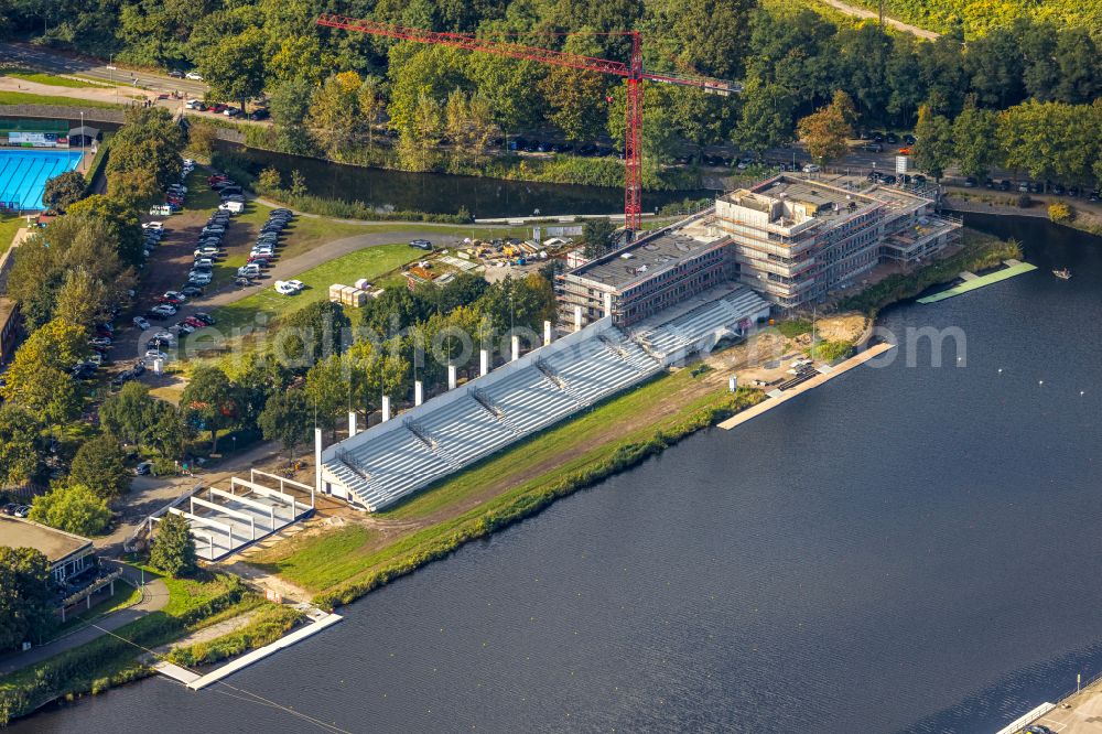 Duisburg from the bird's eye view: Construction site for the new training and competitive sports center of a regatta house with grandstand at the regatta course on Kruppstrasse in the district of Neudorf-Sued in Duisburg in the Ruhr area in the federal state of North Rhine-Westphalia, Germany