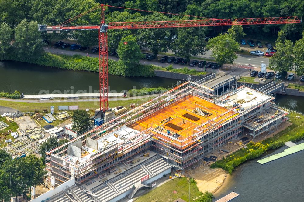 Duisburg from the bird's eye view: Construction site for the new training and competitive sports center of a regatta house with grandstand at the regatta course on Kruppstrasse in the district of Neudorf-Sued in Duisburg in the Ruhr area in the federal state of North Rhine-Westphalia, Germany