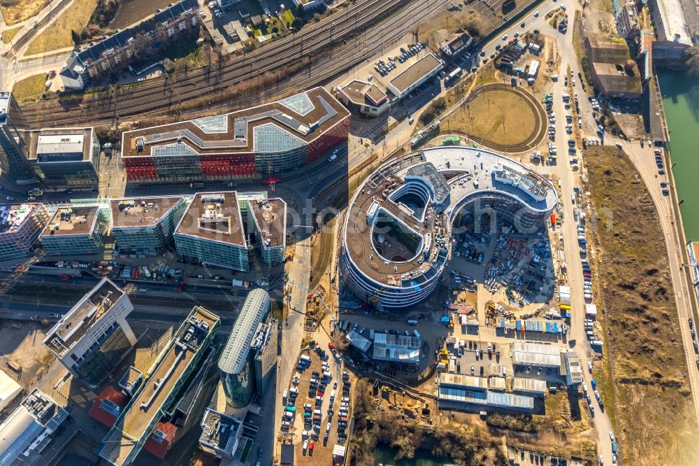 Düsseldorf from the bird's eye view: Construction site for the new building trivago-Zentrale on Kesselstrasse in the district Medienhafen in Duesseldorf in the state North Rhine-Westphalia