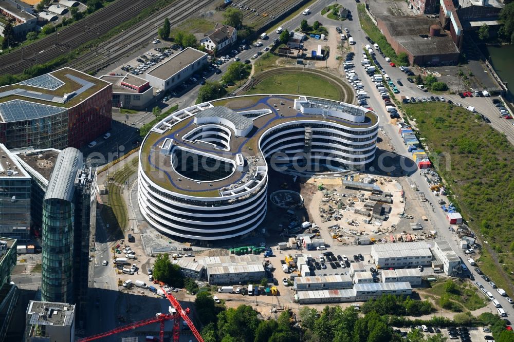 Düsseldorf from the bird's eye view: Construction site for the new building trivago-Zentrale on Kesselstrasse in the district Medienhafen in Duesseldorf in the state North Rhine-Westphalia