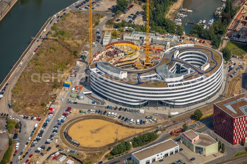 Düsseldorf from the bird's eye view: Construction site for the new building trivago-Zentrale on Kesselstrasse in the district Medienhafen in Duesseldorf in the state North Rhine-Westphalia