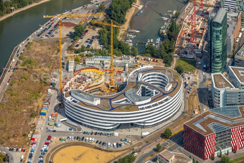 Aerial photograph Düsseldorf - Construction site for the new building trivago-Zentrale on Kesselstrasse in the district Medienhafen in Duesseldorf in the state North Rhine-Westphalia