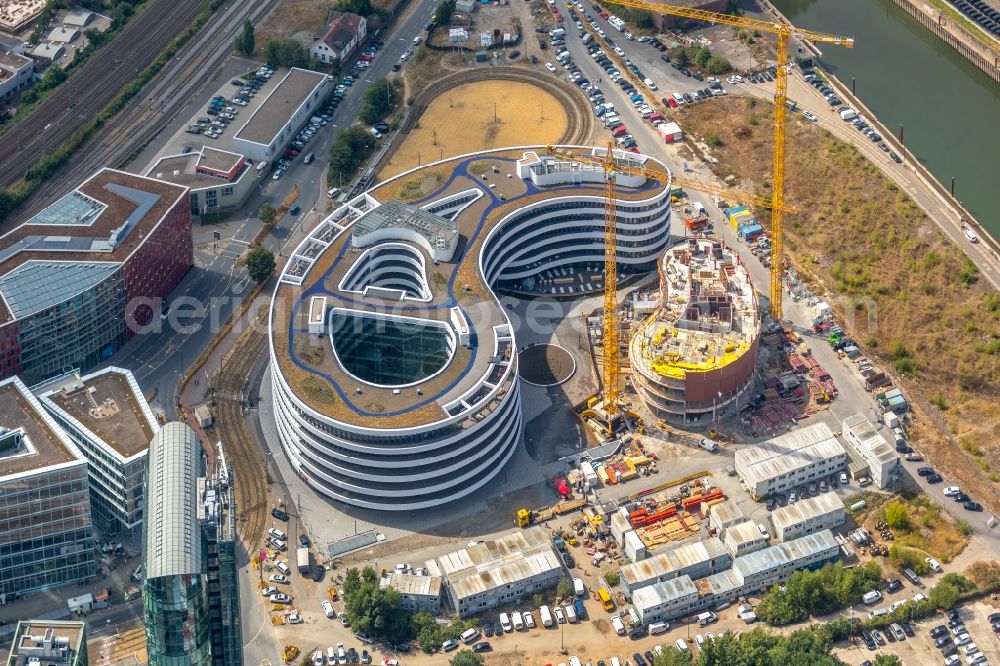 Düsseldorf from the bird's eye view: Construction site for the new building trivago-Zentrale on Kesselstrasse in the district Medienhafen in Duesseldorf in the state North Rhine-Westphalia