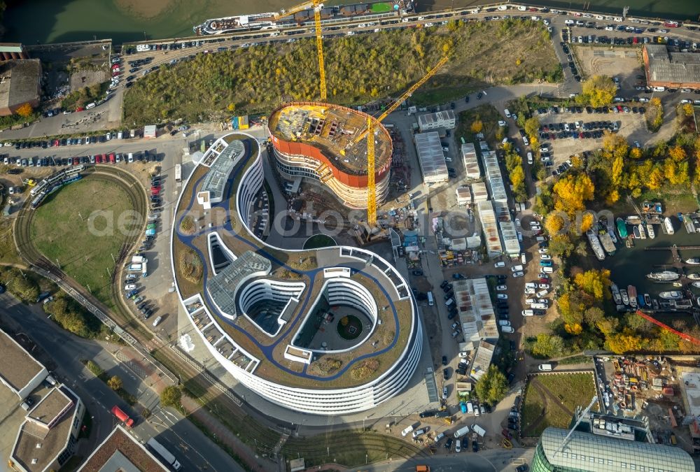 Düsseldorf from the bird's eye view: Construction site for the new building trivago-Zentrale on Kesselstrasse in the district Medienhafen in Duesseldorf in the state North Rhine-Westphalia