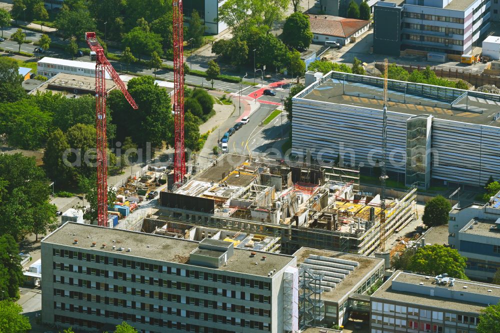 Aerial image Münster - Complementary new construction site on the campus-university building complex of Universitaet on street Corrensstrasse - Domagkstrasse - Wilhelm-Klemm-Strasse in Muenster in the state North Rhine-Westphalia, Germany