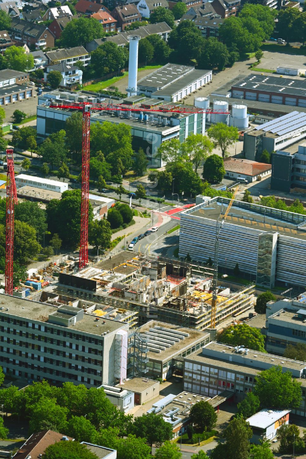 Aerial photograph Münster - Complementary new construction site on the campus-university building complex of Universitaet on street Corrensstrasse - Domagkstrasse - Wilhelm-Klemm-Strasse in Muenster in the state North Rhine-Westphalia, Germany