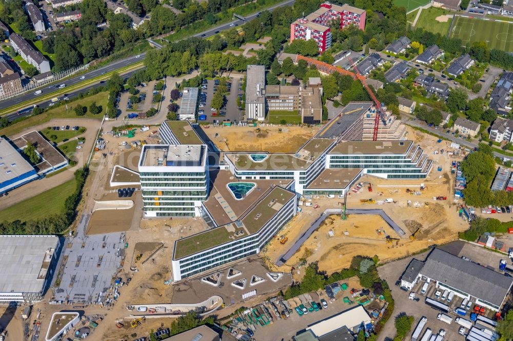 Essen from the bird's eye view: New construction of the company administration building ALDI-Nord Campus on Eckenbergstrasse in Essen at Ruhrgebiet in the state North Rhine-Westphalia, Germany