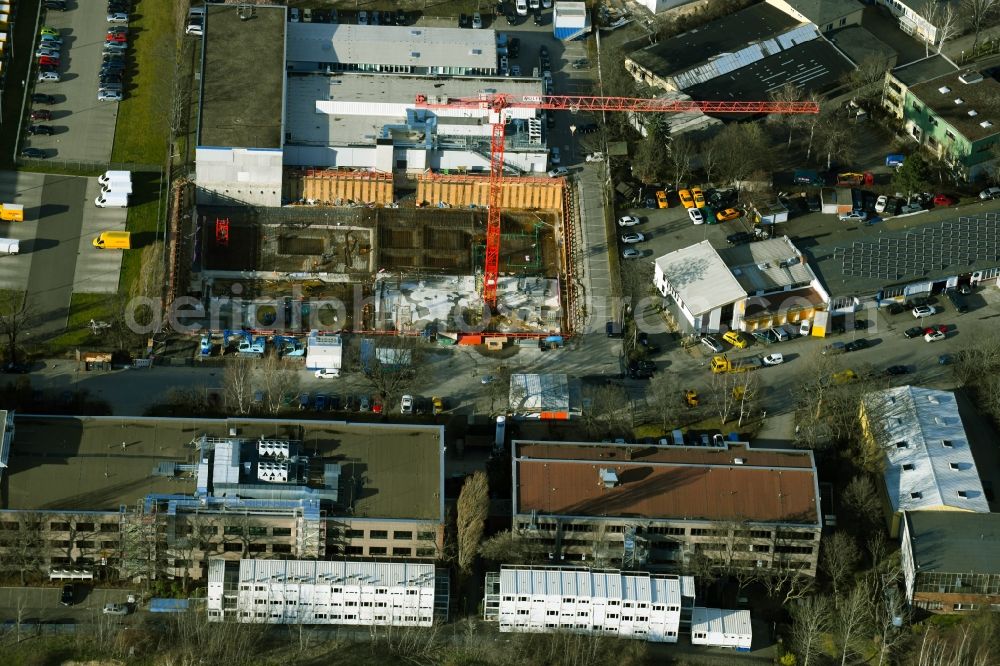 Berlin from above - New construction of the company administration building of Berliner Glas KGaA Herbert Kubatz GmbH & Co. on Waldkraiburger Strasse in the district Britz in Berlin, Germany