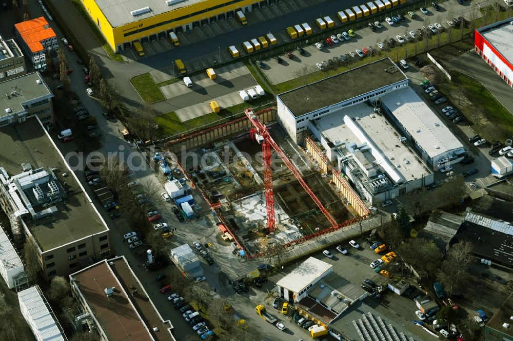 Berlin from the bird's eye view: New construction of the company administration building of Berliner Glas KGaA Herbert Kubatz GmbH & Co. on Waldkraiburger Strasse in the district Britz in Berlin, Germany