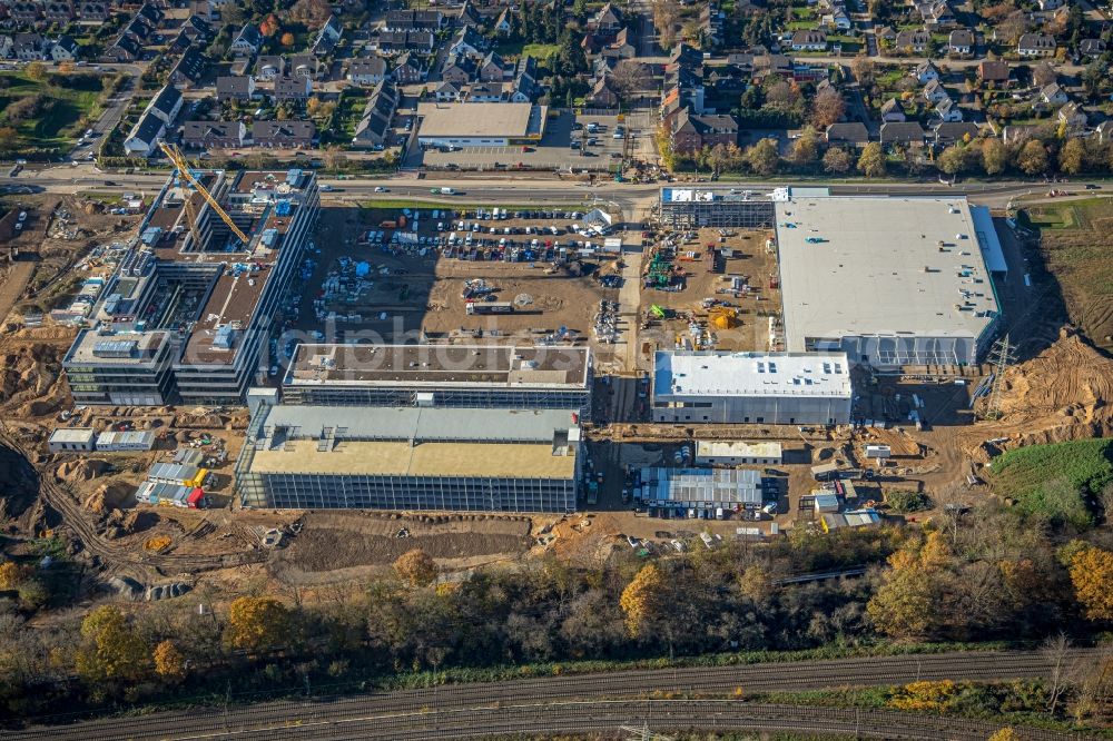 Aerial image Moers - New construction of the company administration building of EDEKA Handelsgesellschaft Rhein-Ruhr mbH on Rheinberger Strasse in the district Repelen in Moers in the state North Rhine-Westphalia, Germany