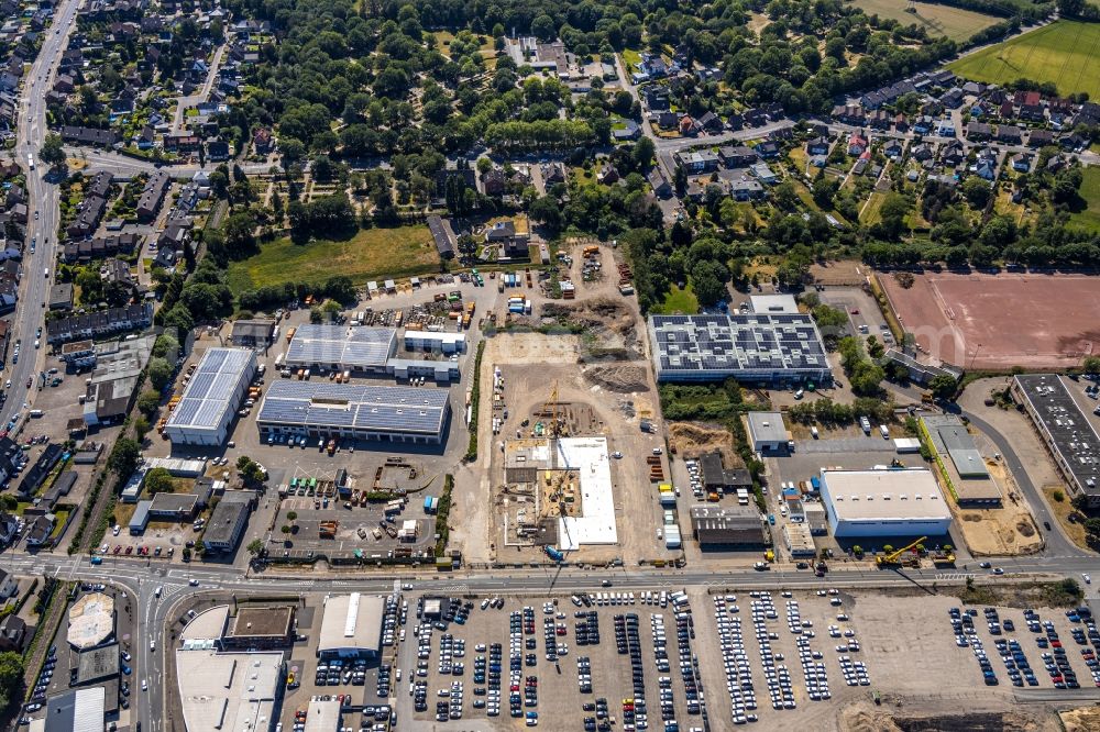 Moers from the bird's eye view: New construction of the company administration building of ENNI-Gruppe on the site of the old carpentry Cleve on Jostenhof-Areal Am Jostenhof in Moers in the state North Rhine-Westphalia, Germany