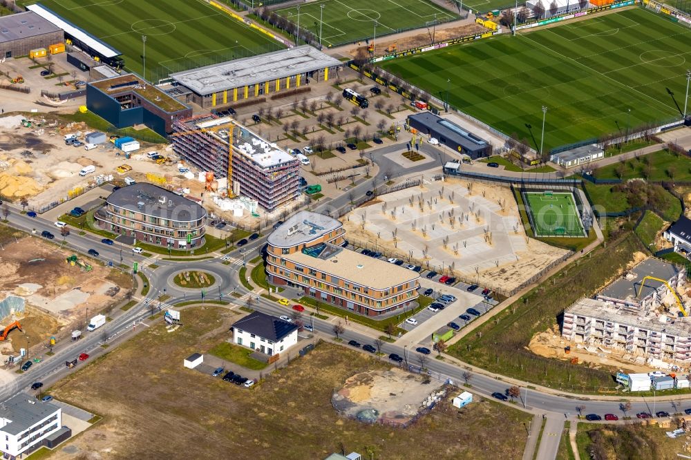 Dortmund from the bird's eye view: New construction of the company administration building of Geschaeftsstelle Sport of the Borussia Dortmund GmbH & Co. KGaA between Adi-Preissler-Allee and Saint-Barbara-Allee in the district Brackeler Feld in Dortmund in the state North Rhine-Westphalia, Germany