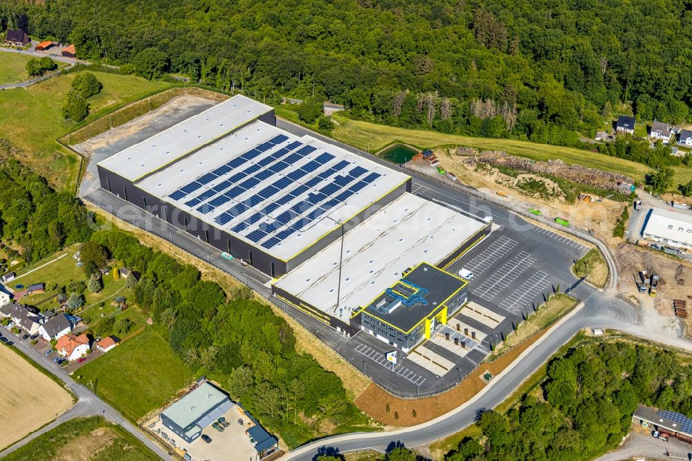 Arnsberg from above - New construction of the company administration building and Logistikzentrums of TRIO Leuchten GmbH on Oststrasse in Vosswinkel in the state North Rhine-Westphalia, Germany