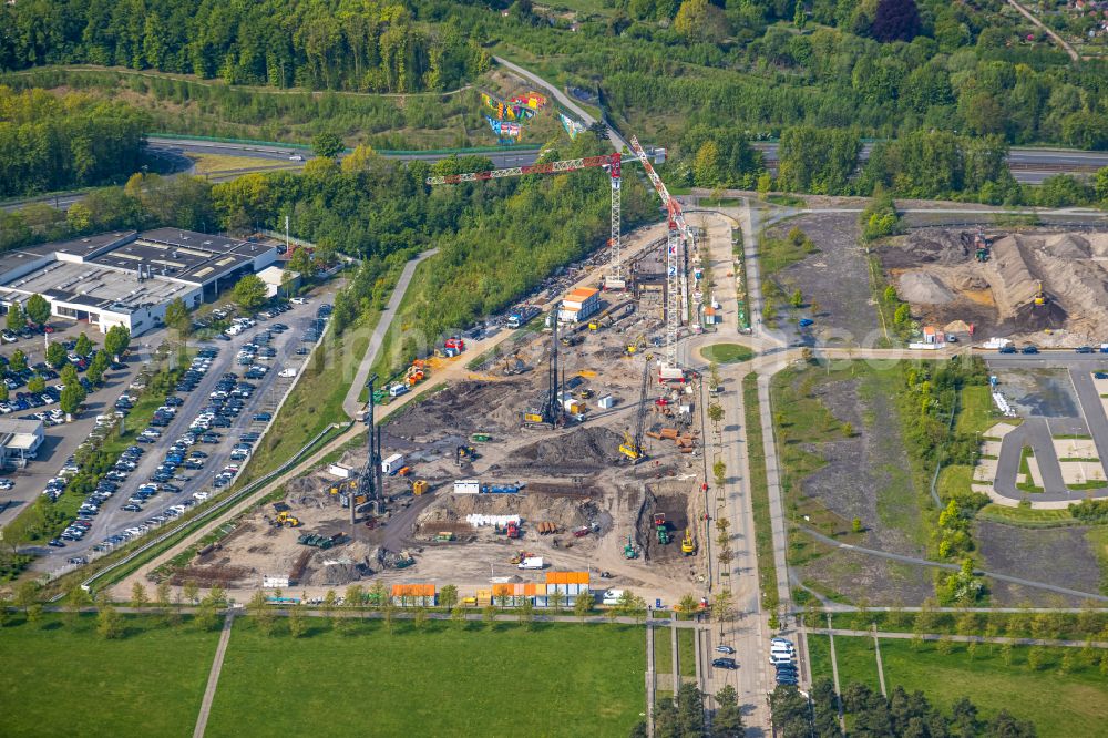 Dortmund from the bird's eye view: New construction of the company administration building of Materna Information & Communications SE on street Robert-Schuman-Strasse in the district Phoenix West in Dortmund at Ruhrgebiet in the state North Rhine-Westphalia, Germany