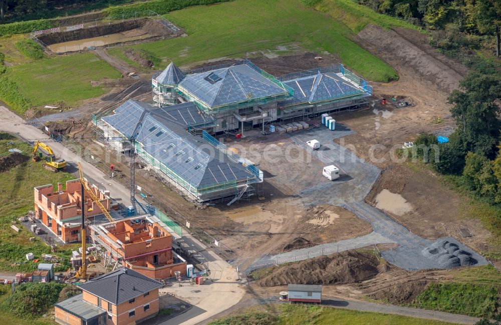 Arnsberg from above - Construction site of a luxury villa in residential area of single-family settlement Zum Dollberg in Arnsberg in the state North Rhine-Westphalia, Germany