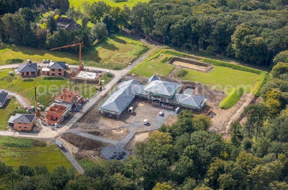 Arnsberg from the bird's eye view: Construction site of a luxury villa in residential area of single-family settlement Zum Dollberg in Arnsberg in the state North Rhine-Westphalia, Germany