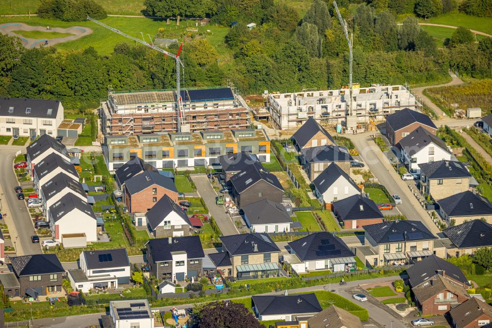 Aerial image Beckum - Construction site of residential area of single-family settlement between Schlehenstrasse and Holunderweg in the district Neubeckum in Beckum at Ruhrgebiet in the state North Rhine-Westphalia, Germany