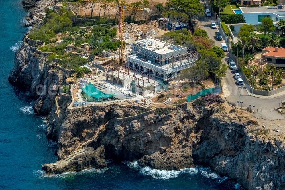 Santa Ponca from above - Construction site of a luxury villa in residential area of single-family settlement on Gran Via dels Malgrats in Santa Ponca in Balearic island of Mallorca, Spain