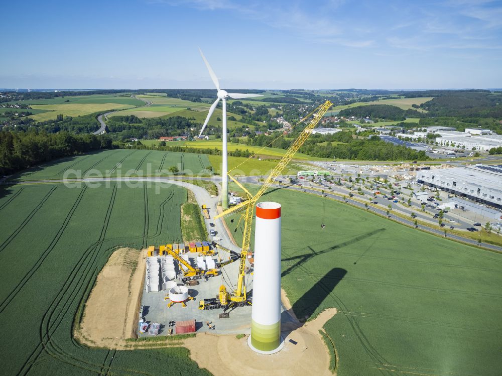 Aerial image Heinsdorfergrund - Agricultural land and fields with new construction site for the construction of wind turbines on street K7810 in Heinsdorfergrund in the state Saxony, Germany