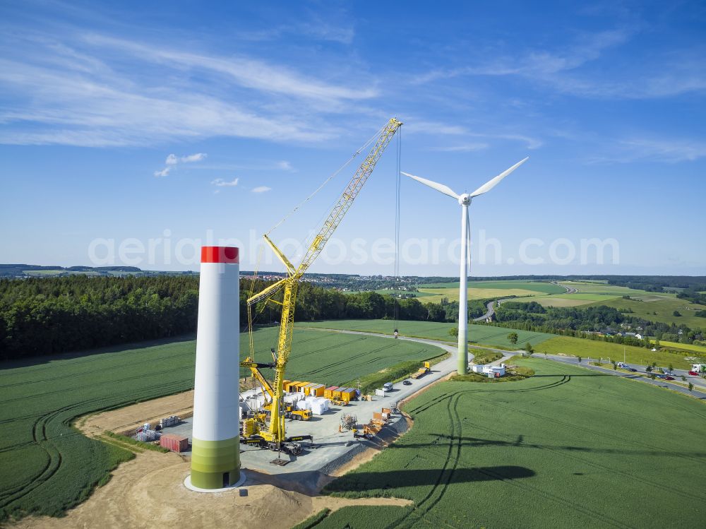 Aerial photograph Heinsdorfergrund - Agricultural land and fields with new construction site for the construction of wind turbines on street K7810 in Heinsdorfergrund in the state Saxony, Germany