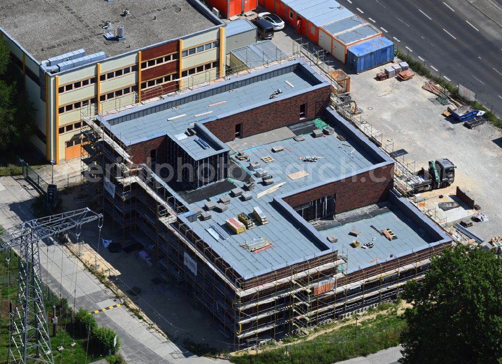 Aerial photograph Berlin - New construction of a residential and commercial building on street Maerkische Allee in the district Marzahn in Berlin, Germany
