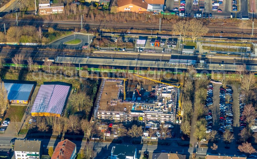 Aerial image Holzwickede - New construction of a residential and commercial building on Bahnhofstrasse in Holzwickede in the state North Rhine-Westphalia, Germany