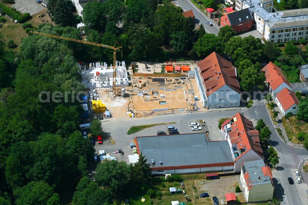 Werneuchen from above - New construction of a residential and commercial building Breite Strasse in Werneuchen in the state Brandenburg, Germany