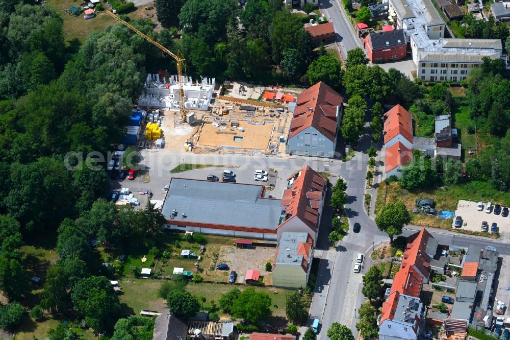 Werneuchen from the bird's eye view: New construction of a residential and commercial building Breite Strasse in Werneuchen in the state Brandenburg, Germany