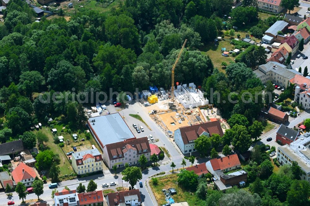 Werneuchen from the bird's eye view: New construction of a residential and commercial building Breite Strasse in Werneuchen in the state Brandenburg, Germany