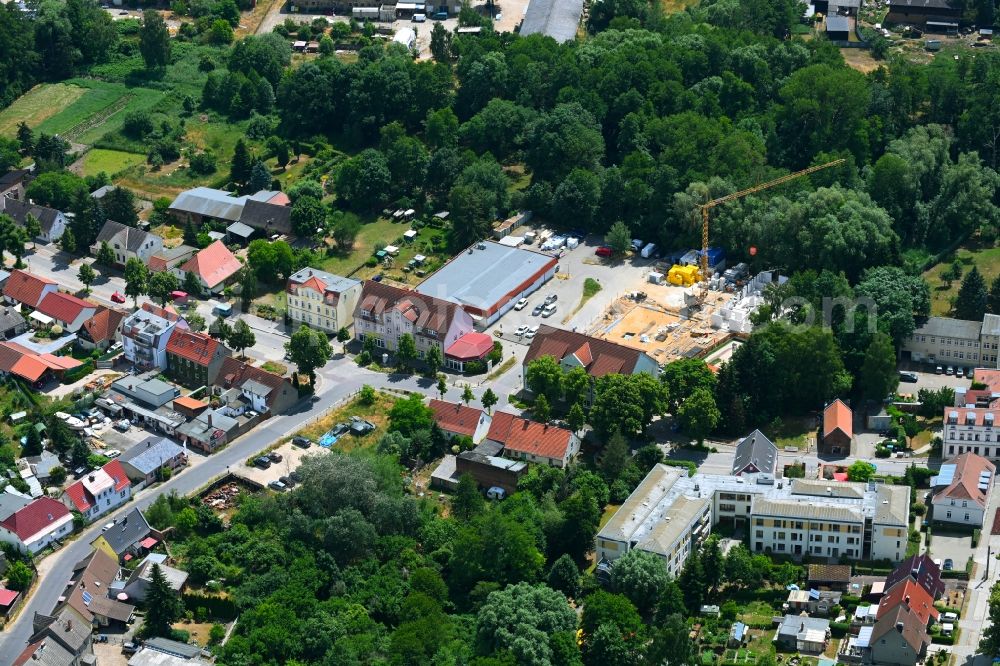 Werneuchen from the bird's eye view: New construction of a residential and commercial building Breite Strasse in Werneuchen in the state Brandenburg, Germany