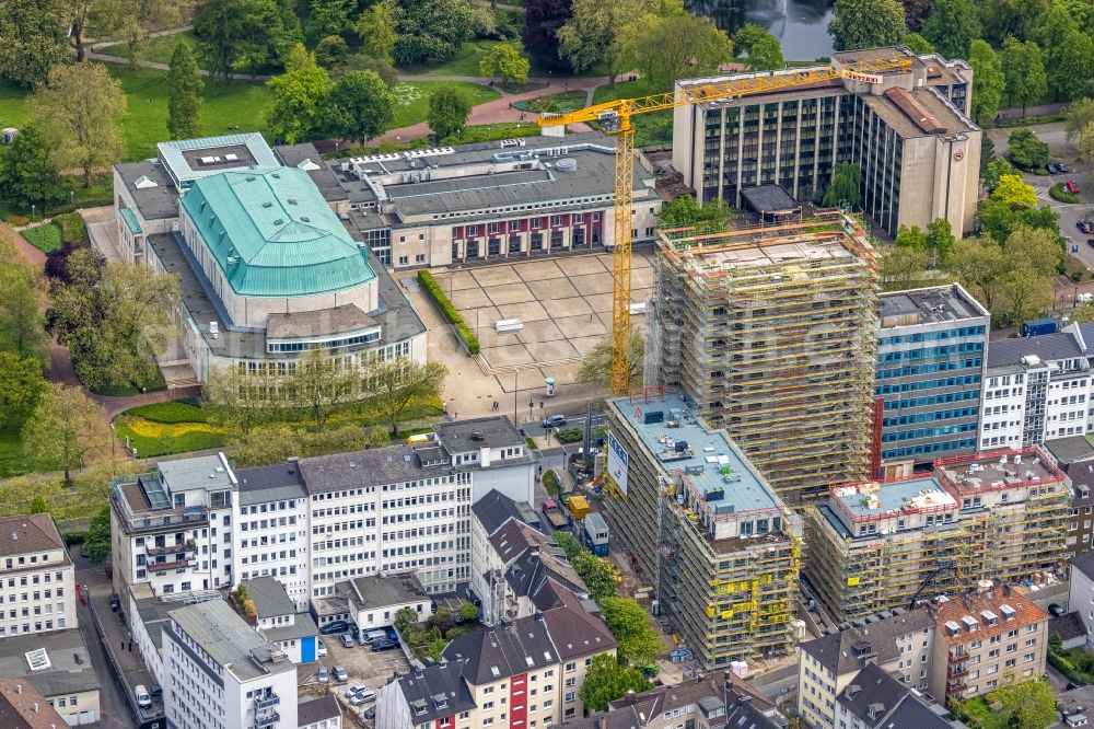 Aerial photograph Essen - Construction site to build a new residential and commercial building HQE Huyssen Quartier Essen with residential tower and senior citizens' apartments on Huyssenallee - corner of Heinrichstrasse in Essen in the Ruhr area in the state North Rhine-Westphalia, Germany