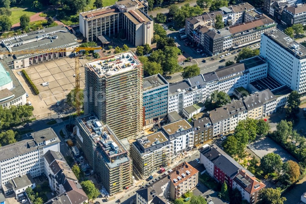 Aerial image Essen - Construction site to build a new residential and commercial building HQE Huyssen Quartier Essen with residential tower and senior citizens' apartments on Huyssenallee - corner of Heinrichstrasse in Essen in the Ruhr area in the state North Rhine-Westphalia, Germany