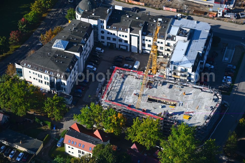 Aerial photograph Bernau - New construction of a residential and commercial building on Jahnstrasse - Neuer Schulweg - Ladenburger Chaussee in Bernau in the state Brandenburg, Germany