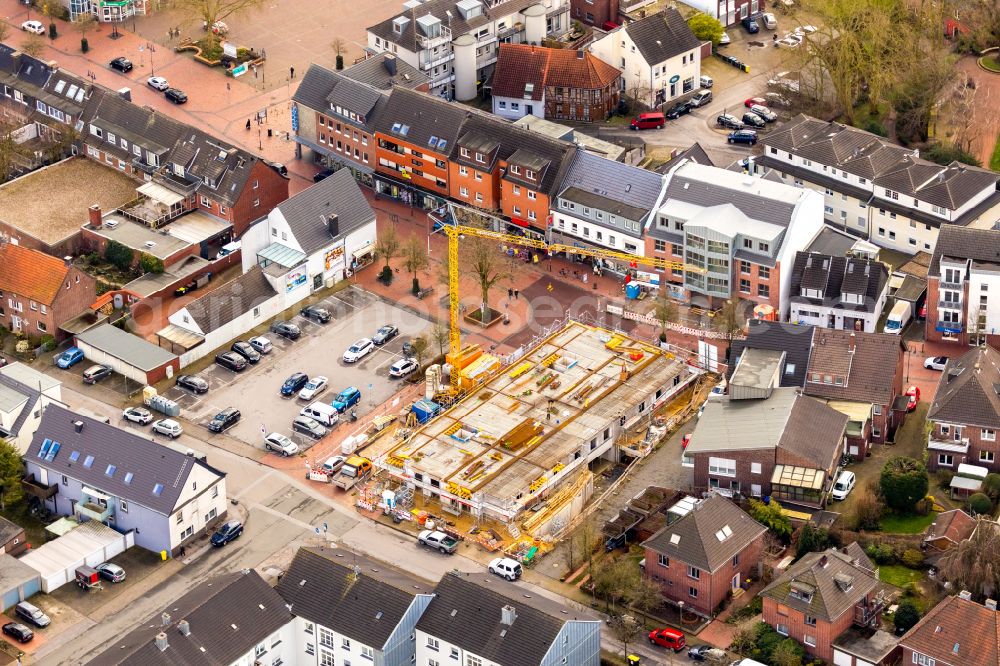 Aerial photograph Kirchhellen - Construction site for a new residential and commercial building of the Kirchhellener Arkaden in Kirchhellen in the state North Rhine-Westphalia, Germany