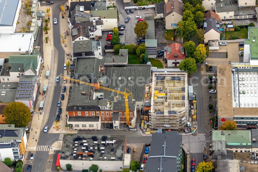 Aerial photograph Menden (Sauerland) - New construction of a residential and commercial building on Poststrasse / Papenhausenstrasse in Menden (Sauerland) in the state North Rhine-Westphalia, Germany