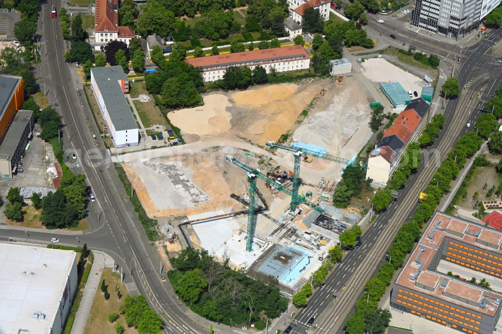 Leipzig from above - Construction site for the new construction of the residential and commercial building district Prague Triangle with a new construction of a high school on Prager Strasse - Philipp-Rosenthal-Strasse in the district Zentrum-Suedost in Leipzig in the state Saxony, Germany