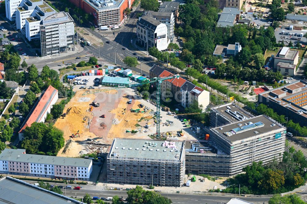 Aerial photograph Leipzig - Construction site for the new construction of the residential and commercial building district Prague Triangle with a new construction of a high school on Prager Strasse - Philipp-Rosenthal-Strasse in the district Zentrum-Suedost in Leipzig in the state Saxony, Germany